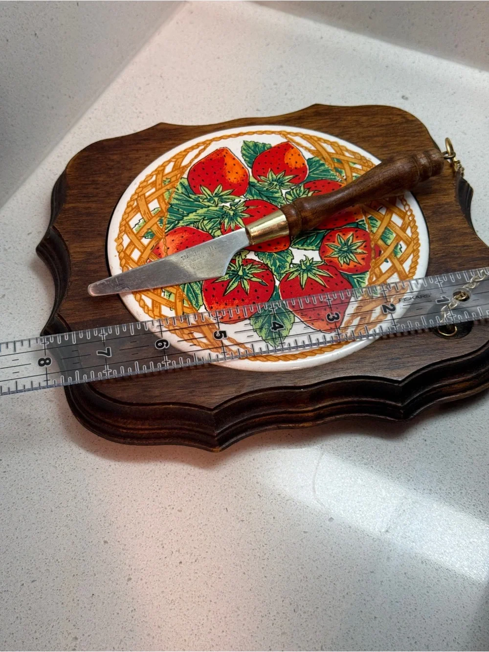 Vintage cheese board with matching knife.